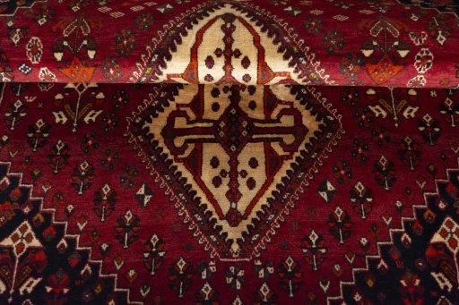 Full view of 2000s Shiraz rug from Iran / Persia, 203 × 138 cm in Red tones