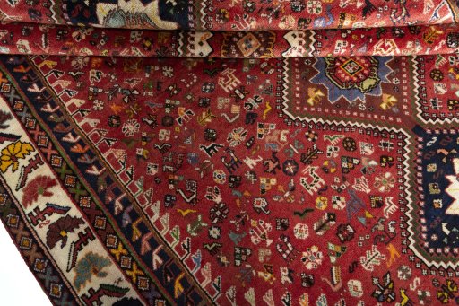 Full view of 2000s Shiraz rug from Iran / Persia, 282 × 203 cm in Red tones