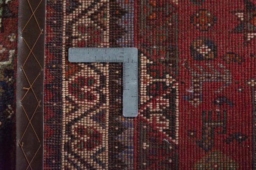 Close-up detail of 2000s Shiraz rug from Iran / Persia showing Wool weave