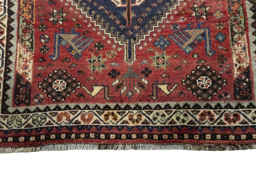 Central medallion detail of 2000s Shiraz rug from Iran / Persia