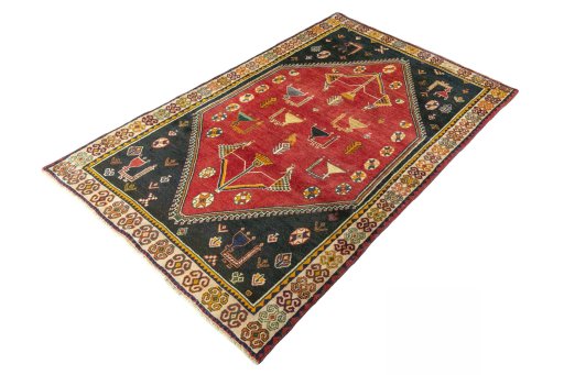 Corner detail of 2000s Shiraz rug showing border pattern and Wool pile