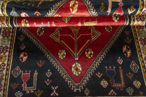 Full view of 2000s Shiraz rug from Iran / Persia, 216 × 133 cm in Red tones