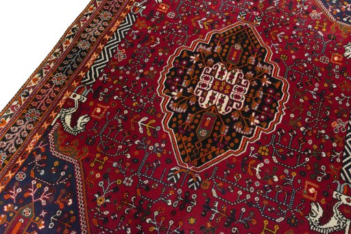Backside of handmade 2000s Shiraz rug showing knot structure and weave density