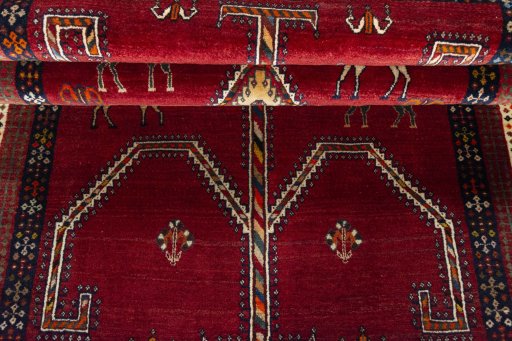 Corner detail of 2000s Shiraz rug showing border pattern and Wool pile