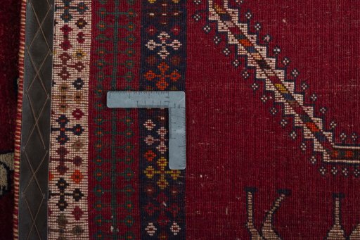 Surface texture of 2000s Shiraz rug with natural Wool and intricate pattern