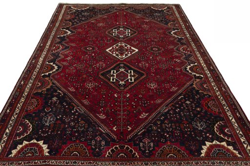 Surface texture of 2000s Shiraz rug with natural Wool and intricate pattern
