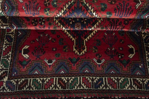 Full view of 2000s Shiraz rug from Iran / Persia, 191 × 126 cm in Red tones