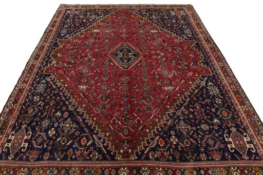 Surface texture of 1970s Shiraz rug with natural Wool and intricate pattern