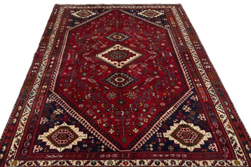 Surface texture of 2000s Shiraz rug with natural Wool and intricate pattern