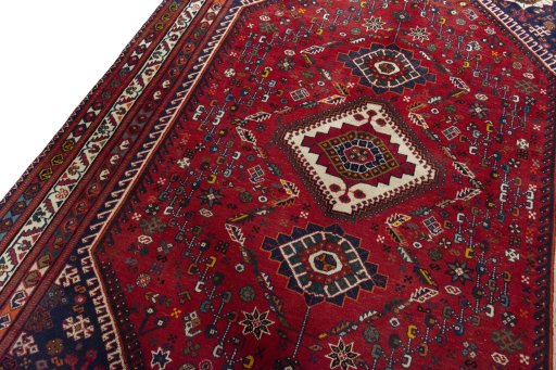 Backside of handmade 2000s Shiraz rug showing knot structure and weave density