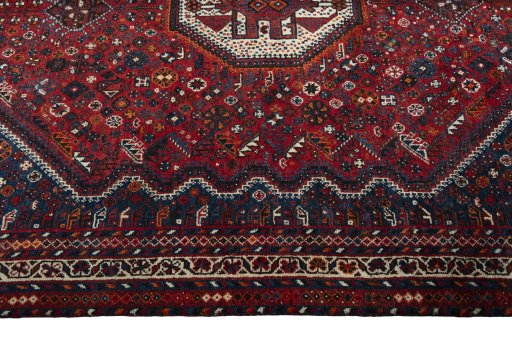Corner detail of 1970s Shiraz rug showing border pattern and Wool pile