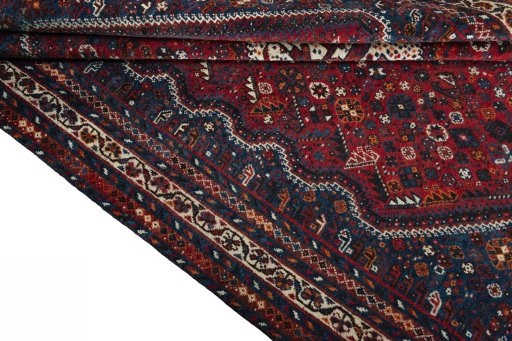 Close-up detail of 1970s Shiraz rug from Iran / Persia showing Wool weave