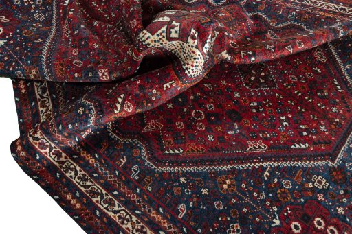 Surface texture of 1970s Shiraz rug with natural Wool and intricate pattern