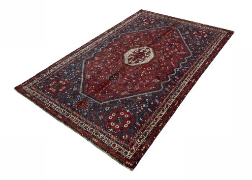 Corner detail of 1970s Shiraz rug showing border pattern and Wool pile