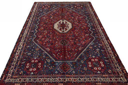 Surface texture of 1970s Shiraz rug with natural Wool and intricate pattern