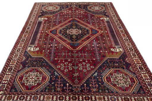 Surface texture of 2000s Shiraz rug with natural Wool and intricate pattern