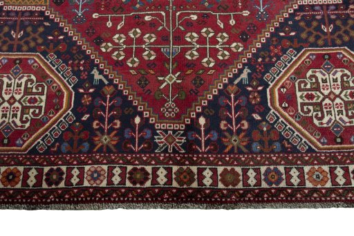 Full view of 2000s Shiraz rug from Iran / Persia, 293 × 210 cm in Red tones