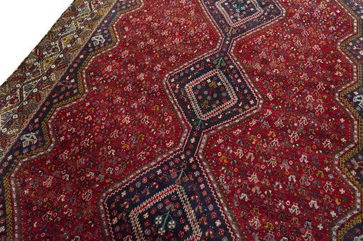 Backside of handmade 2000s Shiraz rug showing knot structure and weave density
