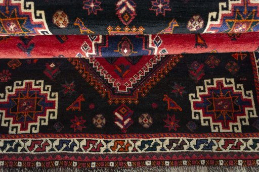 Full view of 2000s Shiraz rug from Iran / Persia, 170 × 123 cm in Red tones