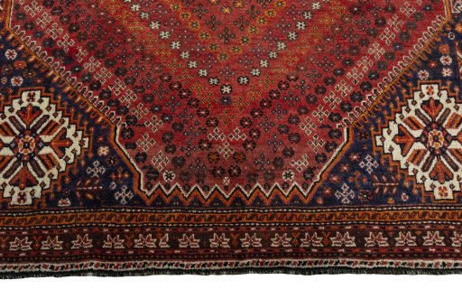 Full view of 2000s Shiraz rug from Iran / Persia, 285 × 200 cm in Red tones