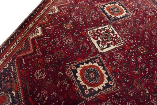Backside of handmade 2000s Shiraz rug showing knot structure and weave density