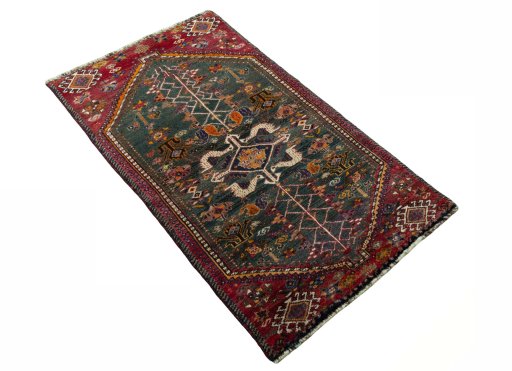 Close-up detail of 2000s Shiraz rug from Iran / Persia showing Wool weave