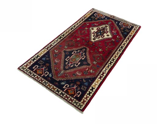 Corner detail of 2000s Shiraz rug showing border pattern and Wool pile
