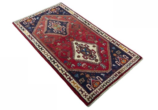 Close-up detail of 2000s Shiraz rug from Iran / Persia showing Wool weave