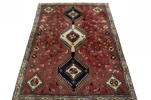 Surface texture of 2000s Shiraz rug with natural Wool and intricate pattern