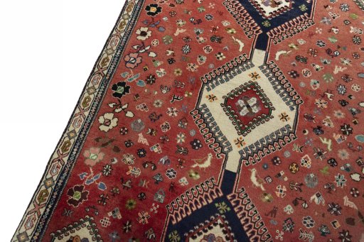 Backside of handmade 2000s Shiraz rug showing knot structure and weave density