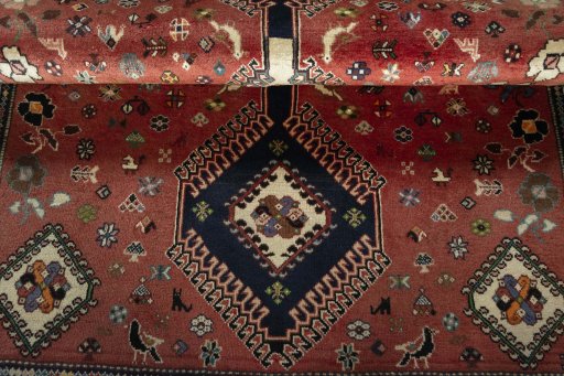 Full view of 2000s Shiraz rug from Iran / Persia, 168 × 120 cm in Red tones