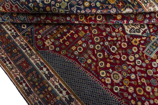 Corner detail of 2000s Shiraz rug showing border pattern and Wool pile