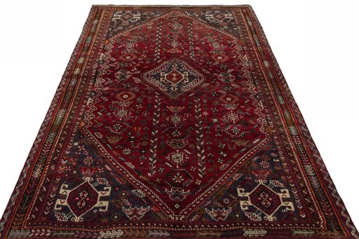 Surface texture of 1970s Shiraz rug with natural Wool and intricate pattern