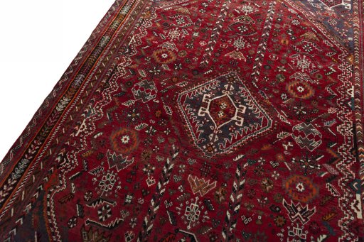 Backside of handmade 1970s Shiraz rug showing knot structure and weave density