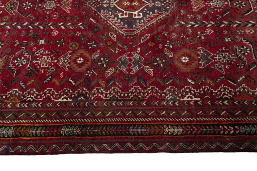 Full view of 1970s Shiraz rug from Iran / Persia, 272 × 174 cm in Red tones