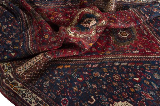 Corner detail of 1970s Shiraz rug showing border pattern and Wool pile
