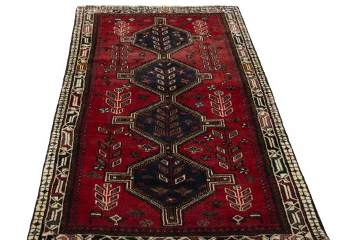 Surface texture of 2000s Shiraz rug with natural Wool and intricate pattern