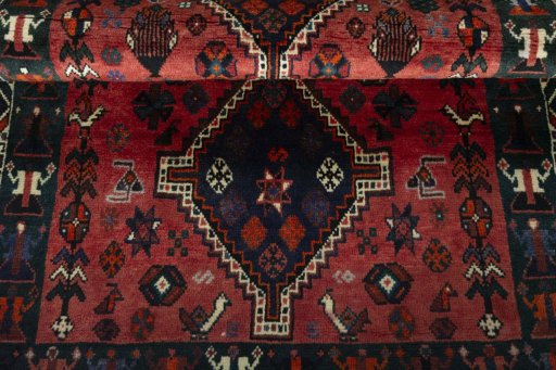 Full view of 2000s Shiraz rug from Iran / Persia, 173 × 108 cm in Red tones