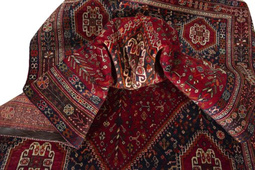 Surface texture of 1970s Shiraz rug with natural Wool and intricate pattern