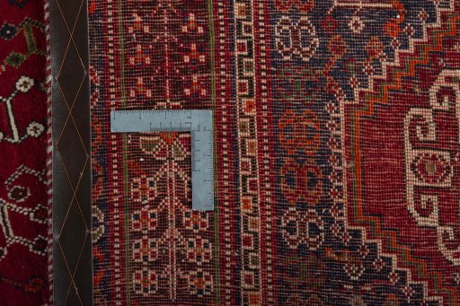 Backside of handmade 1970s Shiraz rug showing knot structure and weave density