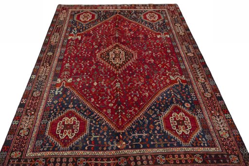 Surface texture of 1970s Shiraz rug with natural Wool and intricate pattern