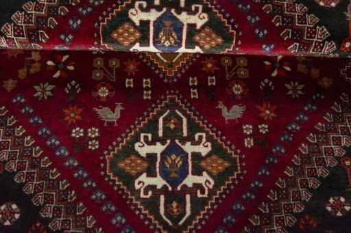 Full view of 2000s Shiraz rug from Iran / Persia, 181 × 122 cm in Red tones
