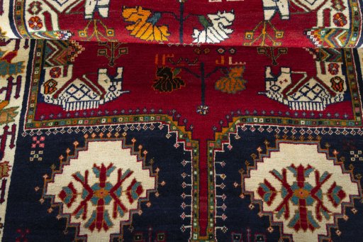 Corner detail of 2000s Shiraz rug showing border pattern and Wool pile