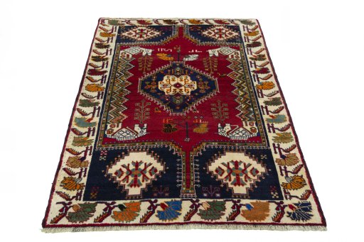Surface texture of 2000s Shiraz rug with natural Wool and intricate pattern