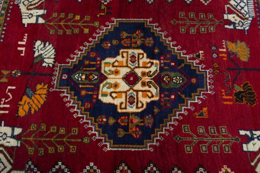 Central medallion detail of 2000s Shiraz rug from Iran / Persia