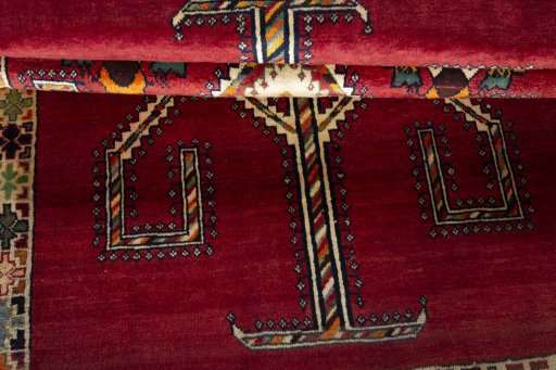 Corner detail of 2000s Shiraz rug showing border pattern and Wool pile