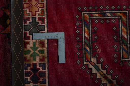 Surface texture of 2000s Shiraz rug with natural Wool and intricate pattern