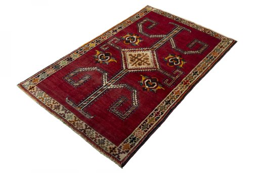 Corner detail of 2000s Shiraz rug showing border pattern and Wool pile