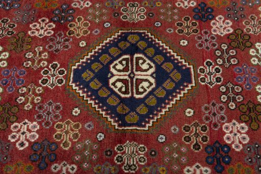 Central medallion detail of 2000s Shiraz rug from Iran / Persia