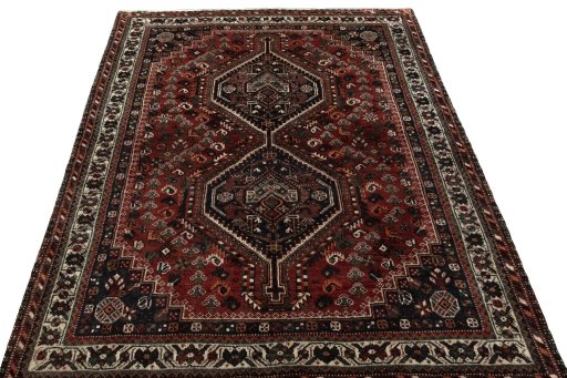 Surface texture of 2000s Shiraz rug with natural Wool and intricate pattern